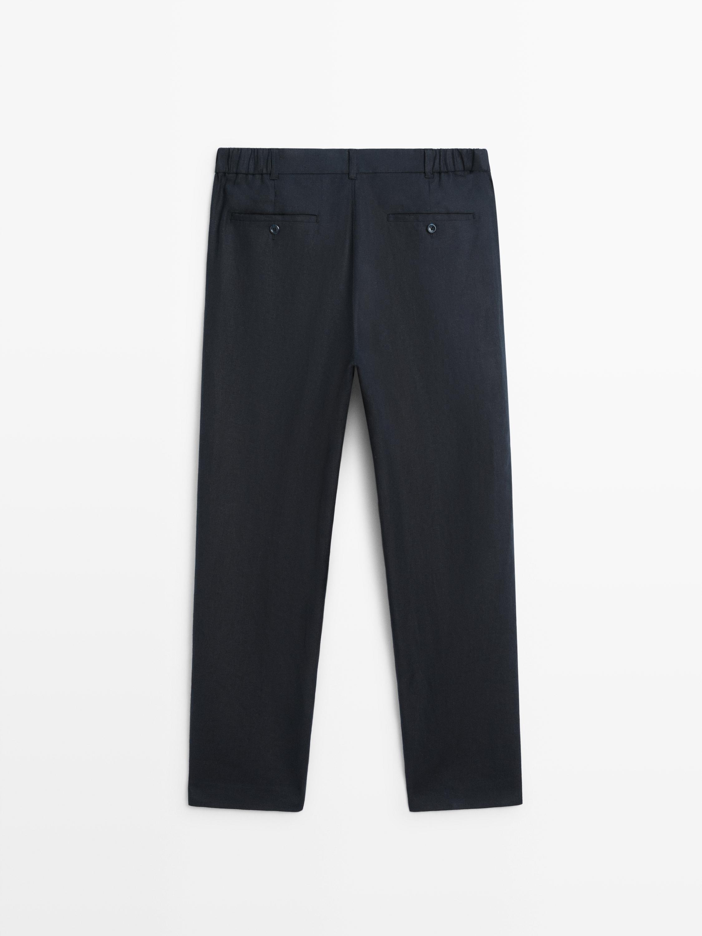 Tapered fit linen trousers